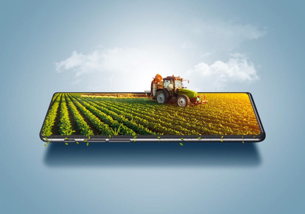 tracteur de concept d agriculture intelligente sur une ferme de smartphone annonces de gestion en ligne